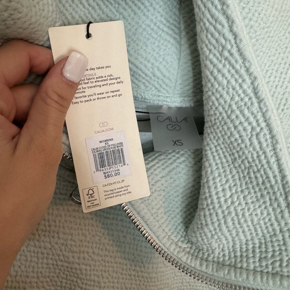Light blue very soft pullover size xsmall never worn with tags